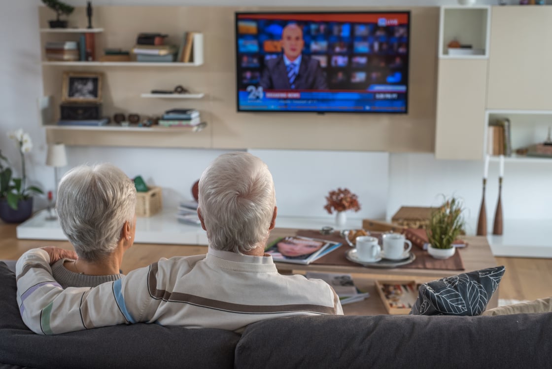 Senior couple watching TV